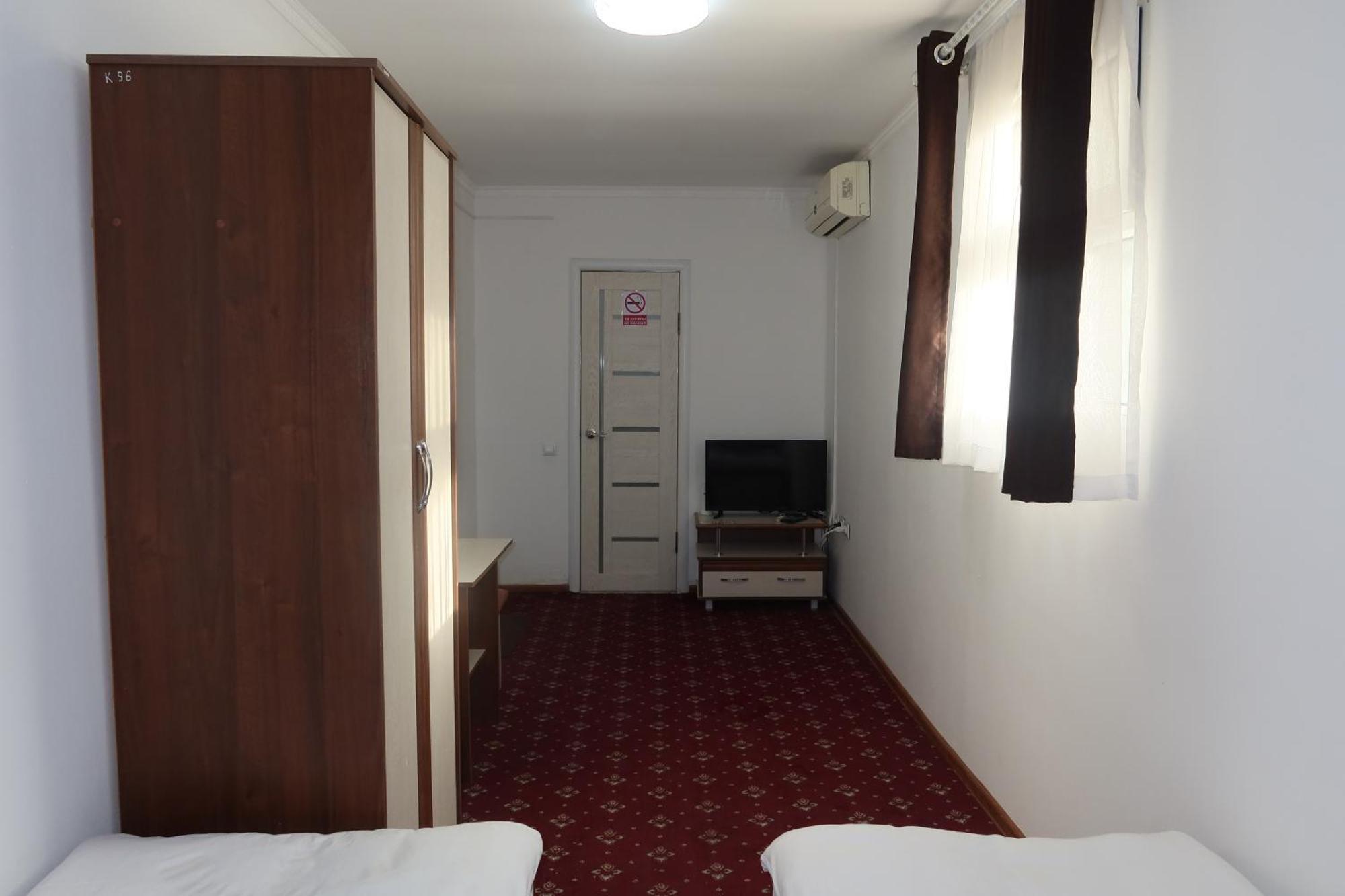 Sultan Kyzyl-Kia Hotel Стая снимка